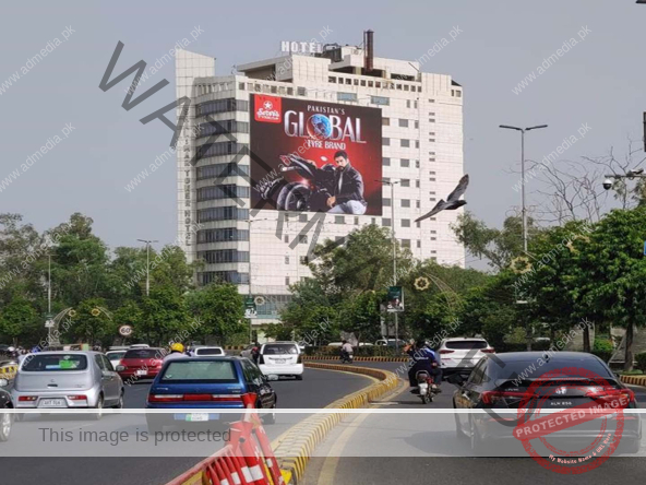 Boost your brand’s reach with Admedia’s premium glass branding opportunity at Shalimar Tower on Jail Road. This prime location captures heavy traffic from key routes, including PIC, Shadman Chowk, and Canal Bank Road, leading toward Siddique Trade Center, Sherpao Bridge, and the bustling Gulberg area. With thousands of daily commuters and potential customers passing by, this site is perfect for high-visibility advertising.